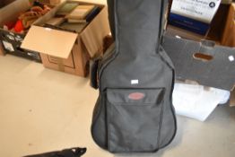A Stagg classical guitar and a padded gig bag