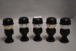 Five vintage Spillers for Home Pride advertising figural kitchen dispensers