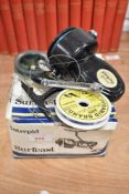An Intrepid Surfcast fishing reel with box and spare line