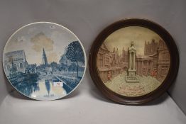 A Victorian relief plaque depicting Manchester Market-sted lane and similar plate for Bruges