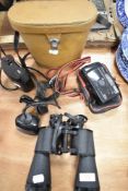 A pair of Cosmo Super binoculars 10x50 field with case and a Nikon camera