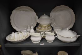 A Duchess part dinner and tea service in a white glaze and gilt finish