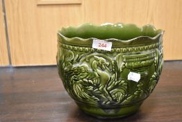 A Victorian planter having embossed dragon design stamped Gregorian to base