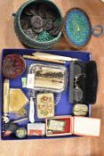 A selection of curios and trinkets including pocket knives and propelling pencil