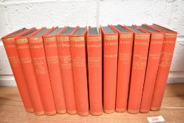 A set of library volumes and literature by H.G Wells