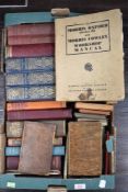 A selection of library volumes and reference books including Lee's Botany, Herbal Simples etc