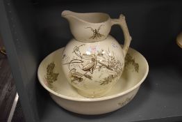 A Victorian wash jug and bowl set having a Poppy and meadow pattern