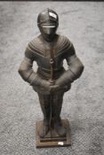 A late Victorian fire side companion set in the form of a medieval knight
