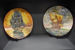 A pair of mid century large charger wall plaques having Spanish galleon design signed G. Moutesinos