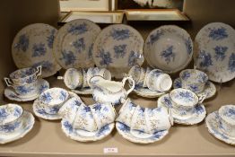 A Victorian porcelain tea service having gilt with traditional blue and white pattern