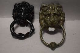Two vintage cast iron lions head door knockers