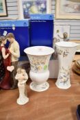 Two Aynsley vase with boxes and two modern Arora figures