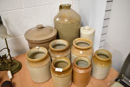 A selection of earthen ware salt glazed kitchen storage jars