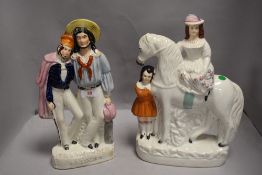 Two antique Staffordshire flat back figures one military related titled the Wounded Soldier