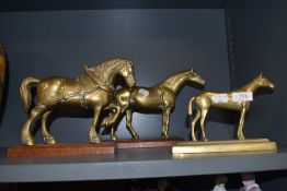 Three Edwardian cast brass horse figures including race horse and shire horse