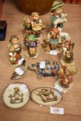 A selection of Geobel figures and figurines, including boy with lamb and girl in tree