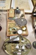 A selection of curios and trinkets including opera glasses, dressing table mirror and hip flasks