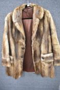 A vintage 20th century fur coat