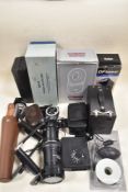 A selection of photographic equipment including Universal bellows, flash, slide duplicator etc
