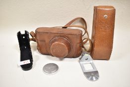 A Canon Rangefinder holder in leather case etc