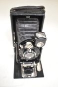 A Houghton Ensign Cameo folding plate camera with Aldis Uno Anastigmat f7.7 lens