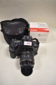 A Canon EOS3 with Canon Zoom EF 28-105mm f3,5 to 4,5 lens