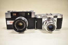 A Yashica 35W with Yashiron 4.5cm 2,8 lens and a Voightlander Vito B with Color-Skoper 50mm 3,5lens