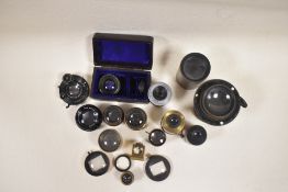 A selection of brass lenses including Beck, Goerz etc