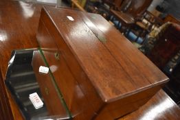 A Victorian mahogany stationery box and vintage frameless wall mirror
