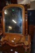 A Victorian satinwood toilet mirror and selection of mahogany mirror frame parts