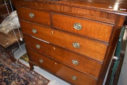 A 19th Century oak chest of two over three drawers, having inlay decoration, brass drop handles