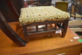 A traditional footstool of small proportions