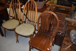 A traditional Ercol kitchen and a pair of similar hoop and stick back high back kitchen chairs