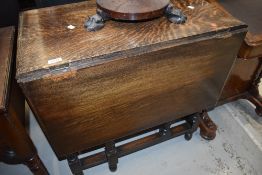 A mid 20th Century dark oak twist gateleg dining table, smaller size