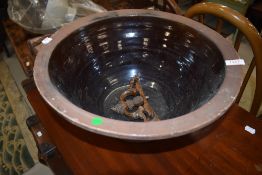 An antique stoneware dough or similar bowl having salt glazed interior