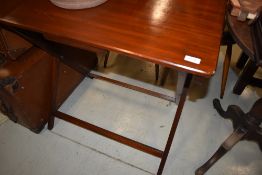 An early 20th Century mahogany folding table, width approx. 77cm