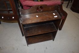 A small Arts and Crafts oak bookshelf, width approx. 45cm