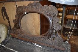 A Victorian carved frame , possibly from mirror back , leaking sap or similar ?