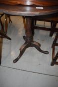 A 19th Century mahogany pedestal table having circular top, turned column and triple splay legs,