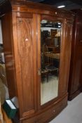 Victorian wardrobe having mahogany case with mirror door and under drawer