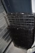 Two small to medium dog cages