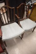A pair of Regency style chair, one dining/one carver