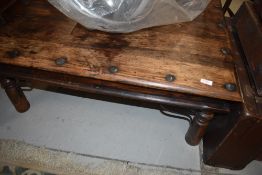 A modern hardwood coffee table approx. 1m x 1m