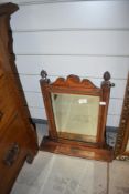 A Victorian stained frame wall mirror with shelf