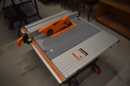 An Evolution 5 portable table saw for building and woodworking