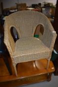 A seagrass tub chair