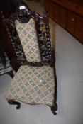 19th century priory or refectory style chair having cabriole legs fret worked back with barley twist
