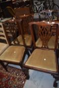 A group of four Georgian style dining chairs