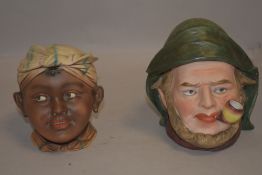Ceramic lidded jars in the form of heads possibly by Bernard Bloch pottery