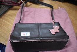 Two modern Radleys ladies fashion hand bags in dark brown and burgundy leather with protective bag